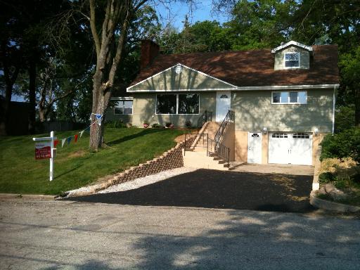 94 Hilldale Road Fox Lake, IL 60020 - Photo 1 of 1 a view of a house with backyard and trees