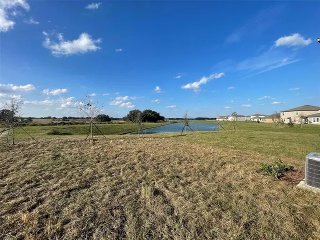 a view of a lake with a city