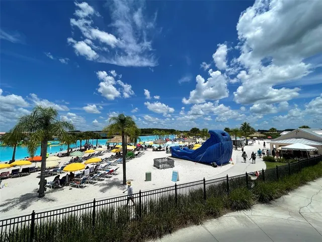 a view of a patio with swimming pool