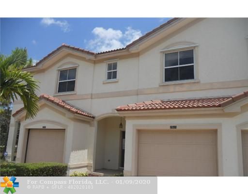 2581 Riverside Drive, Unit 2581 Coral Springs, FL 33065 - Photo 2 of 11 Exterior Front