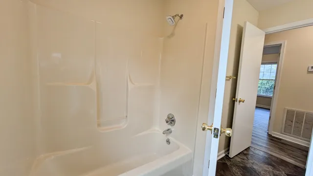 a bathroom with a bathtub