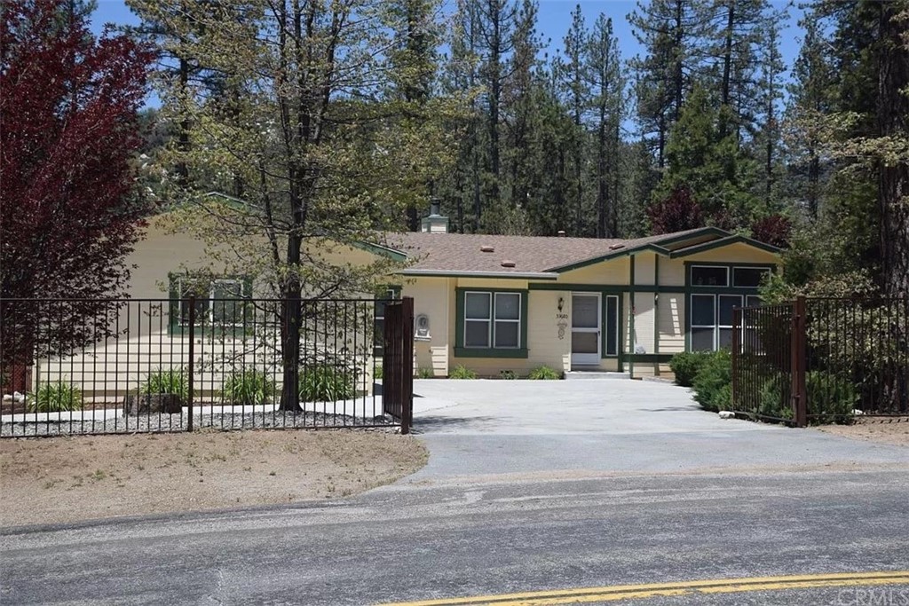 53680 Tollgate Road Idyllwild, CA 92549 - Photo 1 of 1 a front view of a house with a garden
