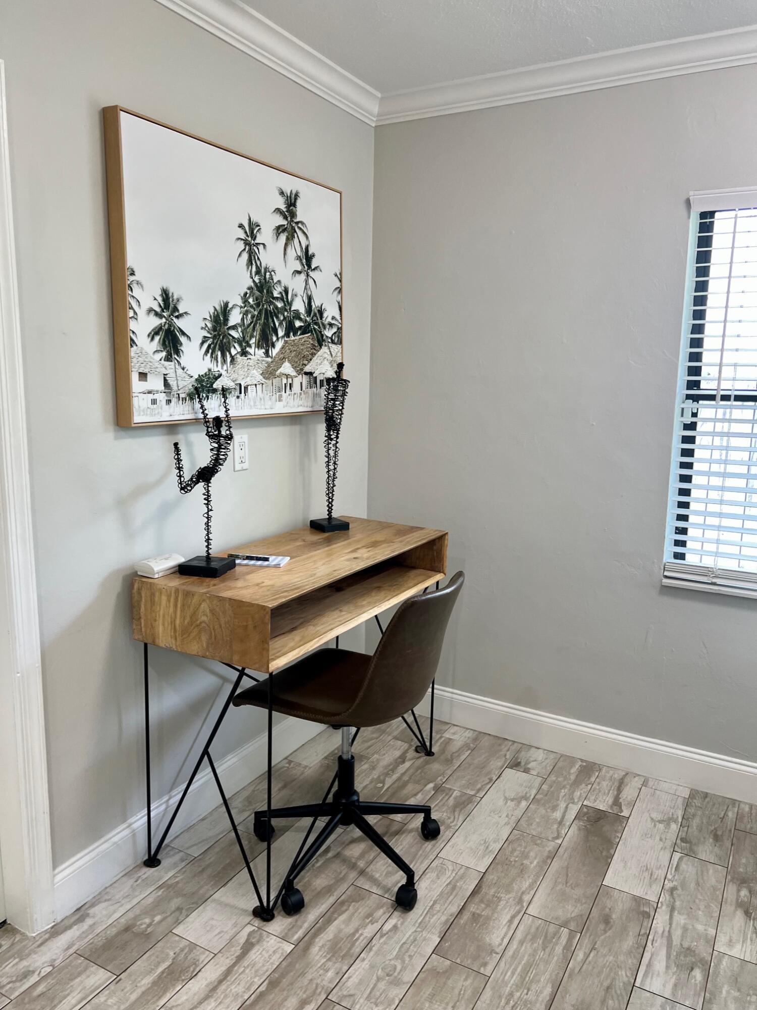 115 Northeast 18th Street Delray Beach, FL 33444 - Photo 11 of 36 a workspace with furniture and window