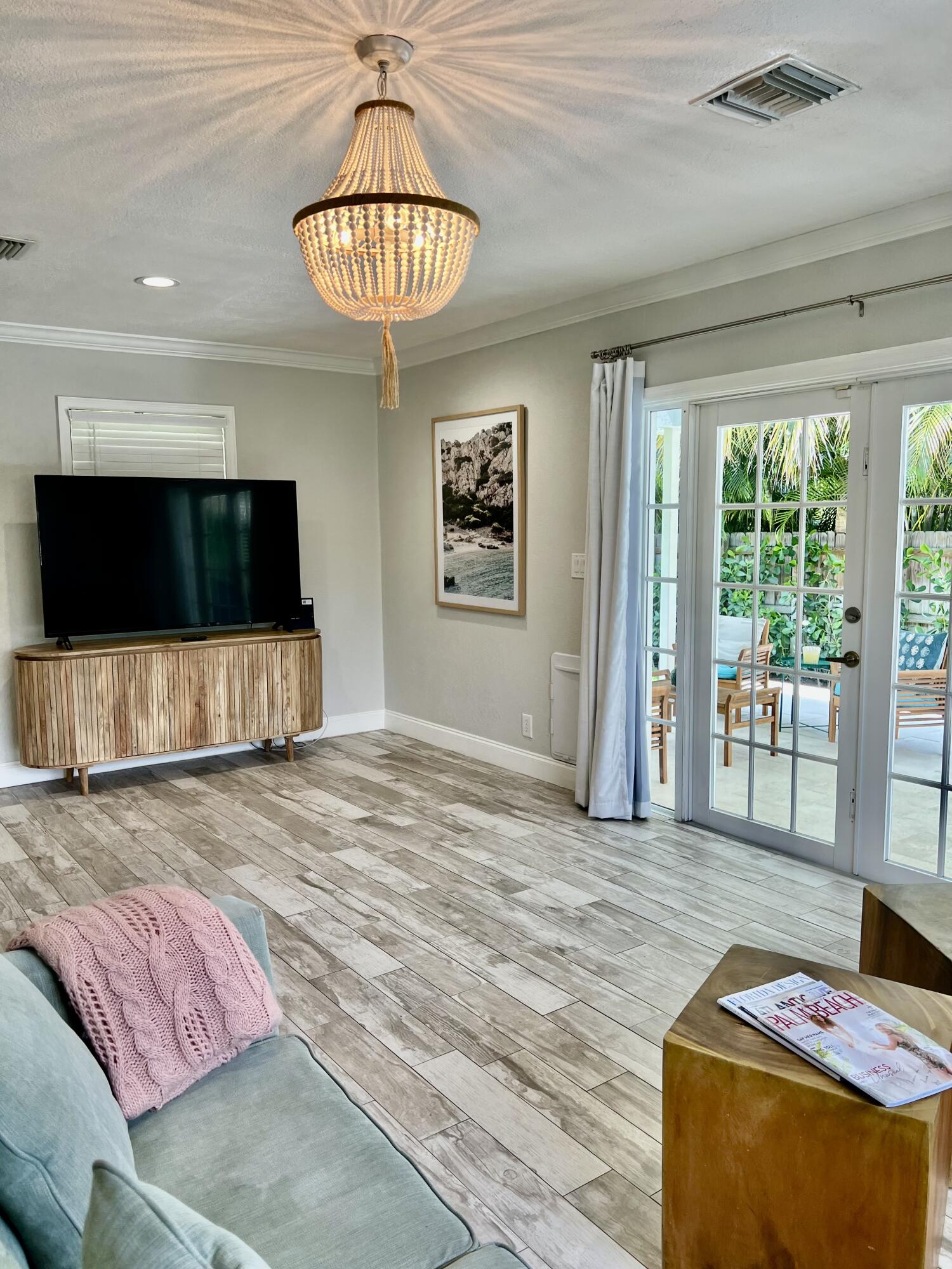 115 Northeast 18th Street Delray Beach, FL 33444 - Photo 22 of 36 a view of livingroom with furniture and floor to ceiling window