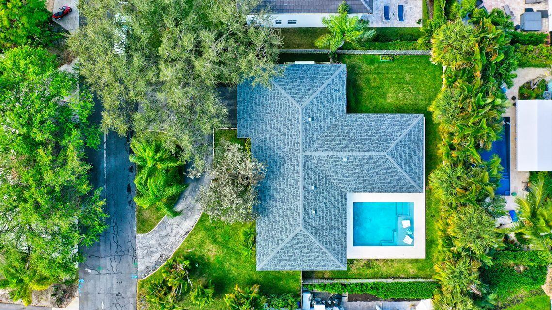 115 Northeast 18th Street Delray Beach, FL 33444 - Photo 3 of 36 an aerial view of a house with a garden
