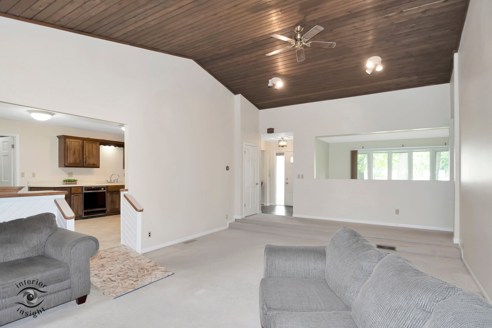 20 Deerfield Avenue Kankakee, IL 60901 - Photo 13 of 36 a view of a livingroom with furniture and a flat screen tv