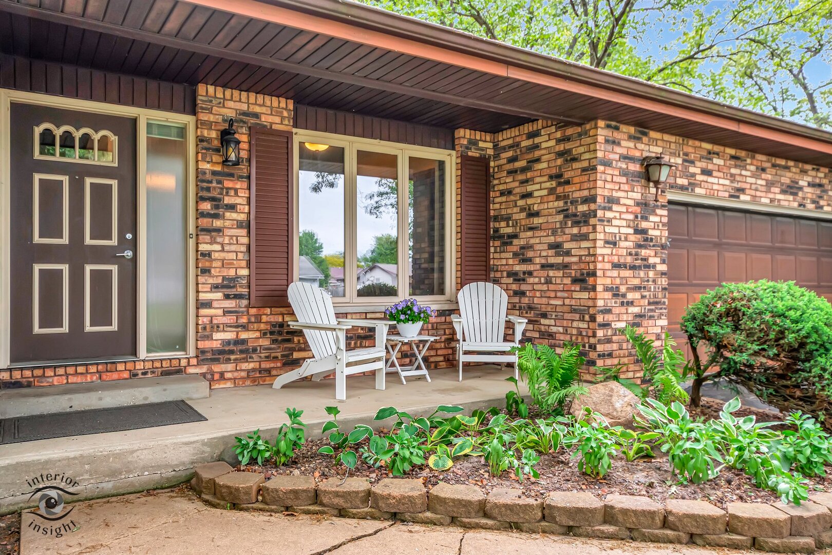 20 Deerfield Avenue Kankakee, IL 60901 - Photo 2 of 36 a view of a patio with table and chairs and potted plants