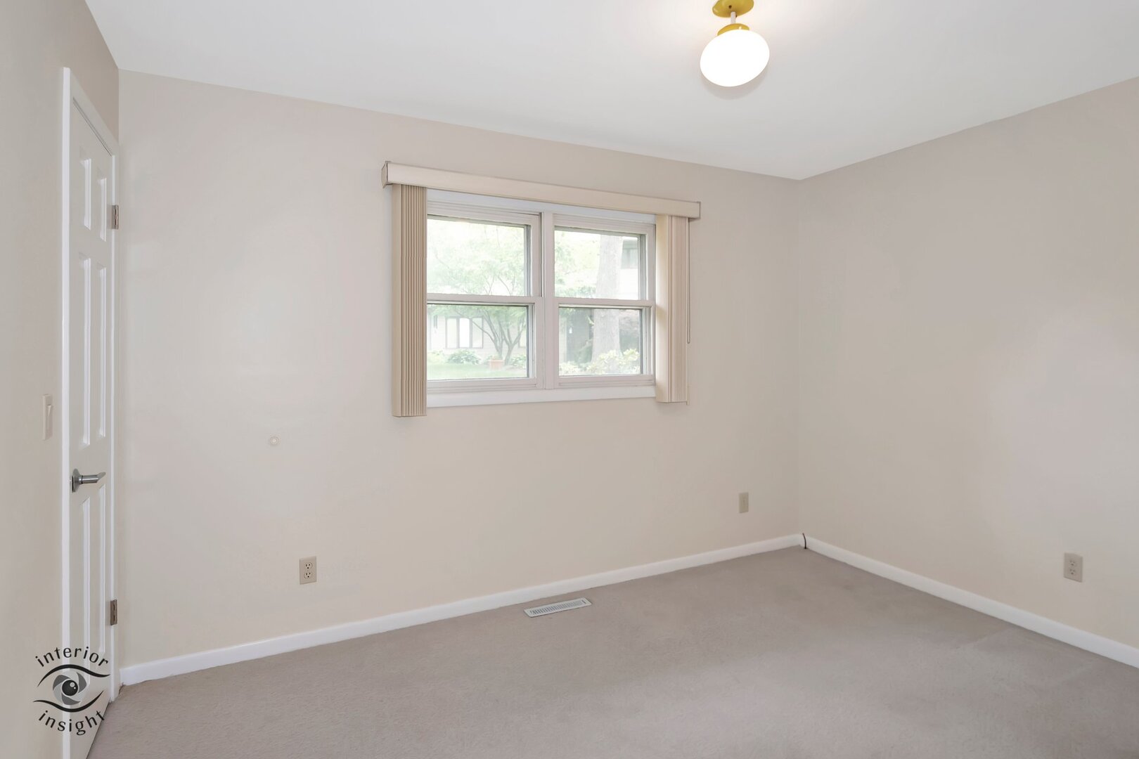 20 Deerfield Avenue Kankakee, IL 60901 - Photo 22 of 36 an empty room with a window