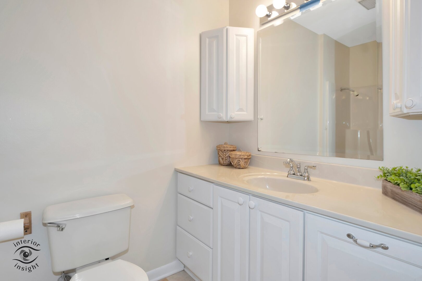 20 Deerfield Avenue Kankakee, IL 60901 - Photo 23 of 36 a bathroom with a granite countertop sink a toilet and a mirror
