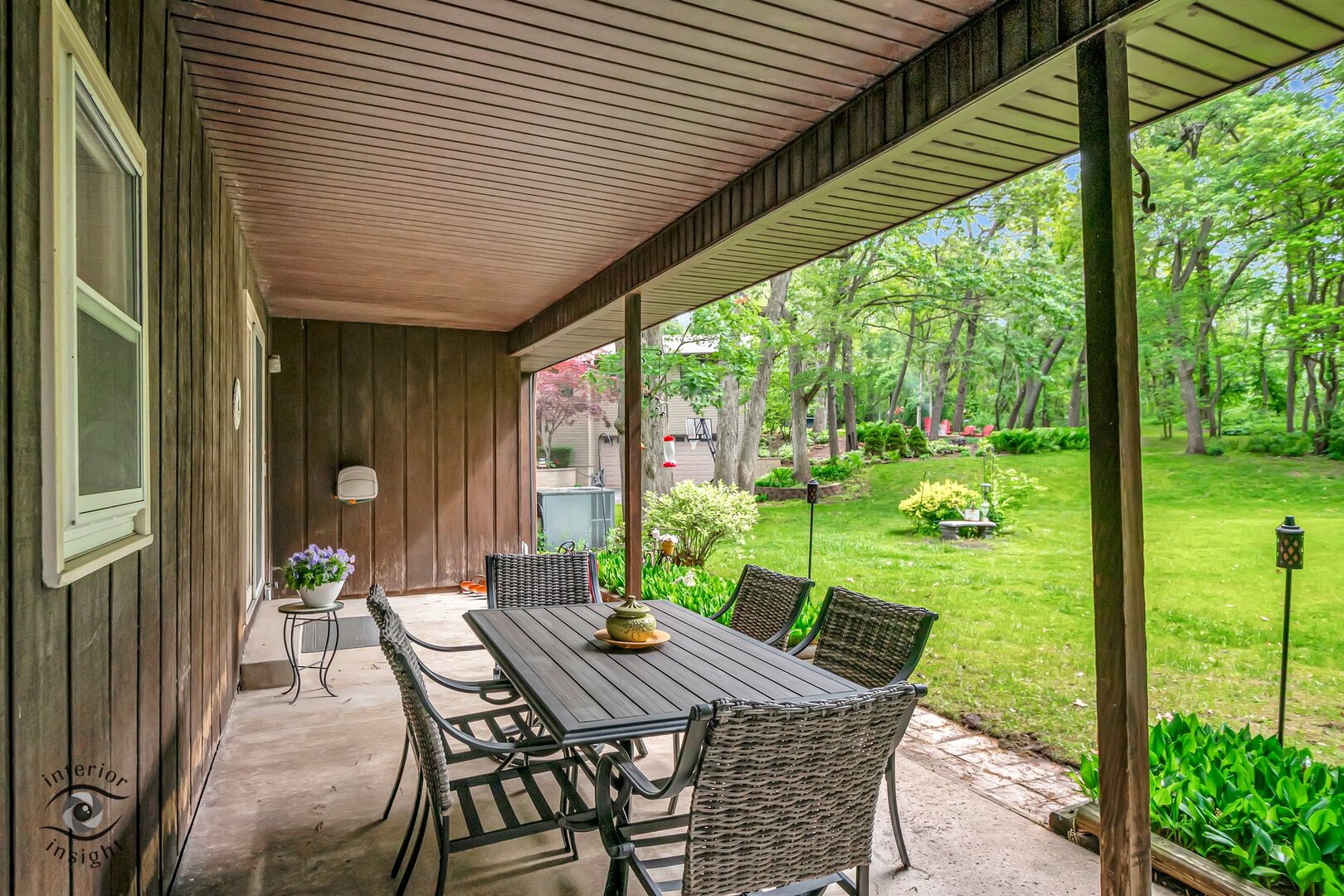 20 Deerfield Avenue Kankakee, IL 60901 - Photo 3 of 36 a view of an outdoor dining space with a table and chairs