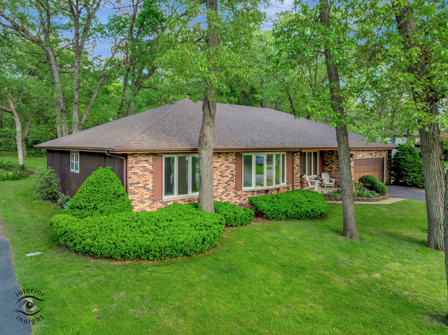 20 Deerfield Avenue Kankakee, IL 60901 - Photo 35 of 36 a view of a house with a yard potted plants and a table