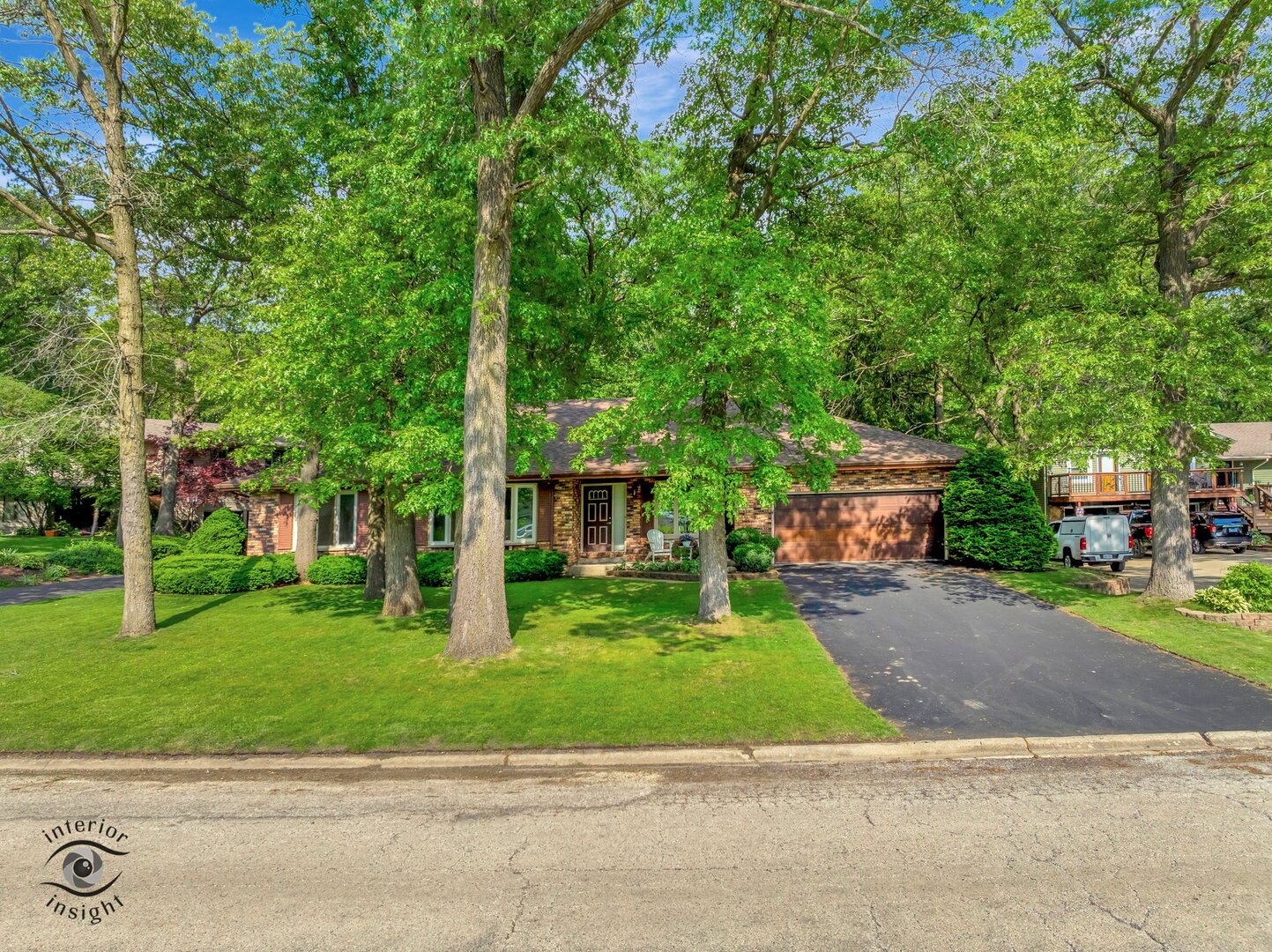 20 Deerfield Avenue Kankakee, IL 60901 - Photo 36 of 36 a front view of a house with a garden and trees