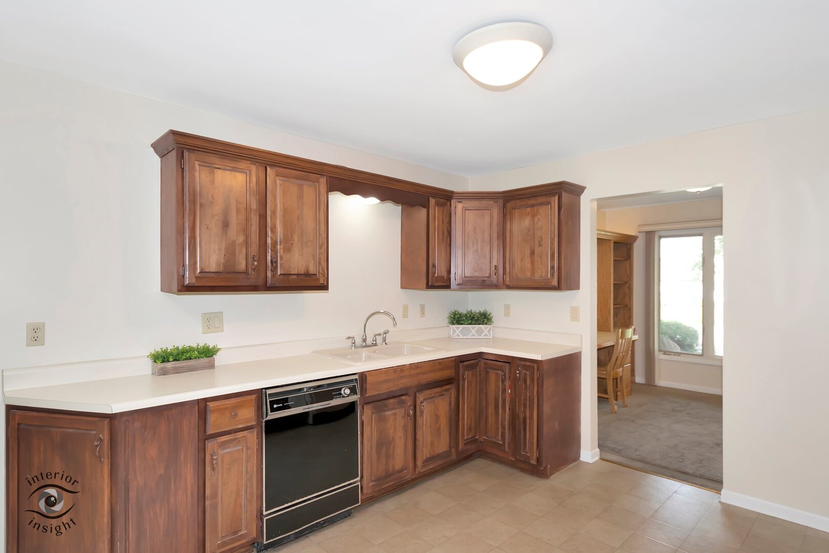 20 Deerfield Avenue Kankakee, IL 60901 - Photo 6 of 36 a kitchen with a sink stove and cabinets