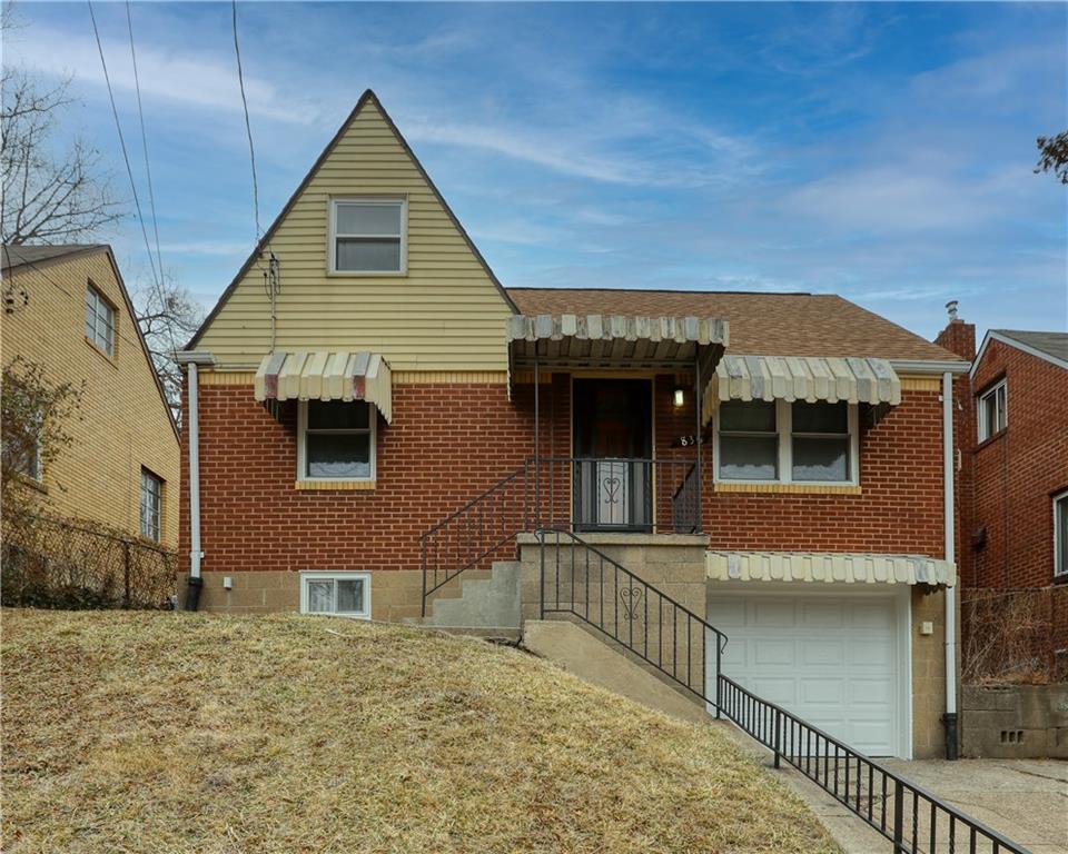 836 Railroad Street McKees Rocks, PA 15136 - Photo 1 of 24 a front view of a house with a yard