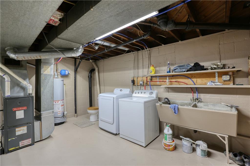 836 Railroad Street McKees Rocks, PA 15136 - Photo 20 of 24 a utility room with dryer and washer