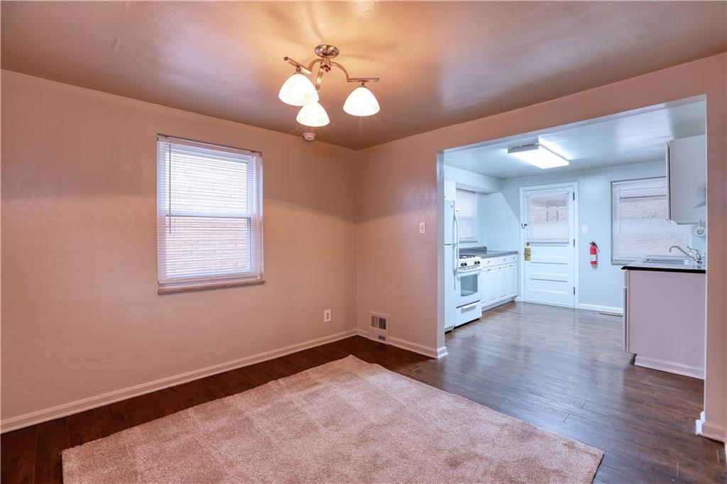 836 Railroad Street McKees Rocks, PA 15136 - Photo 4 of 24 a view of an empty room with a window