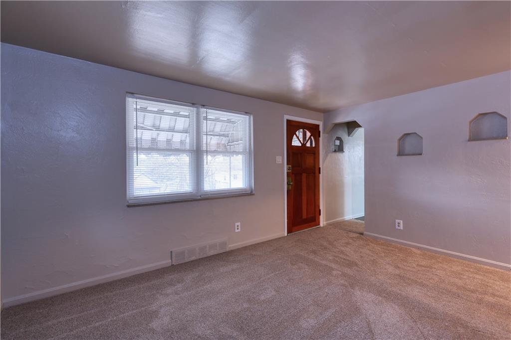 836 Railroad Street McKees Rocks, PA 15136 - Photo 9 of 24 an empty room with windows