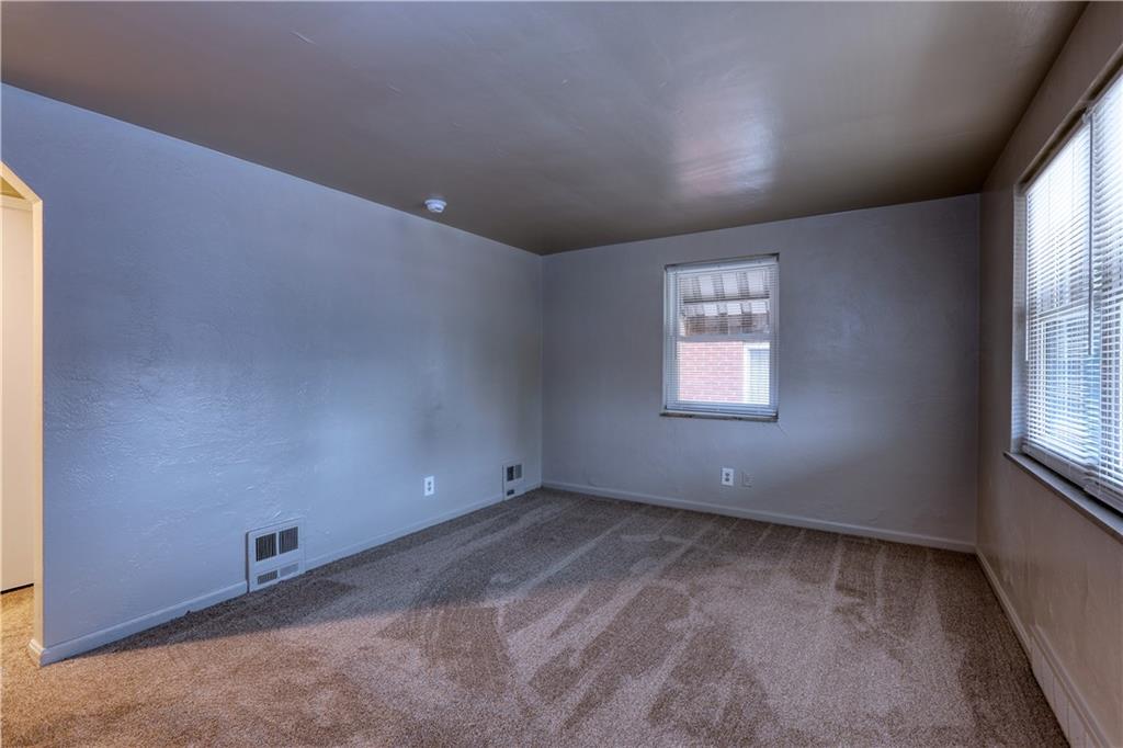 836 Railroad Street McKees Rocks, PA 15136 - Photo 10 of 24 an empty room with windows