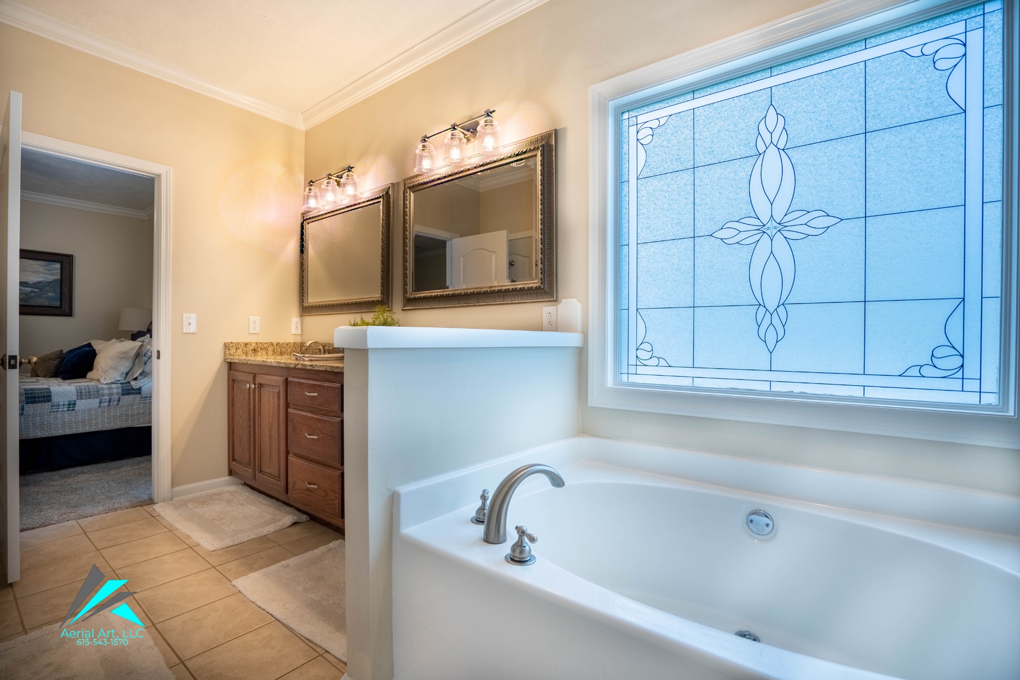 9946 Lebanon Road Murfreesboro, TN 37129 - Photo 13 of 20 a bathroom with a tub sink and mirror