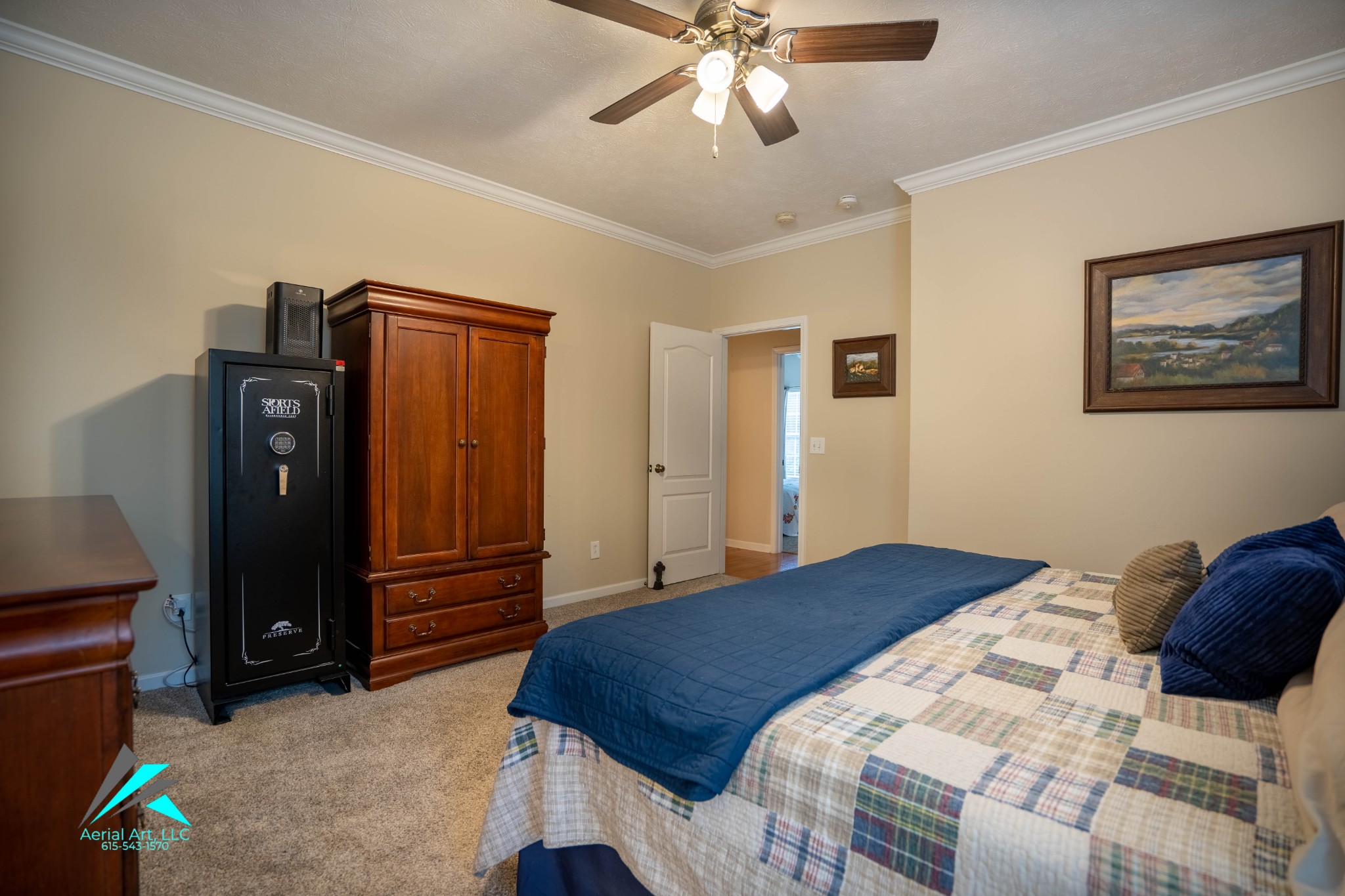 9946 Lebanon Road Murfreesboro, TN 37129 - Photo 14 of 20 a bedroom with a bed and a chandelier