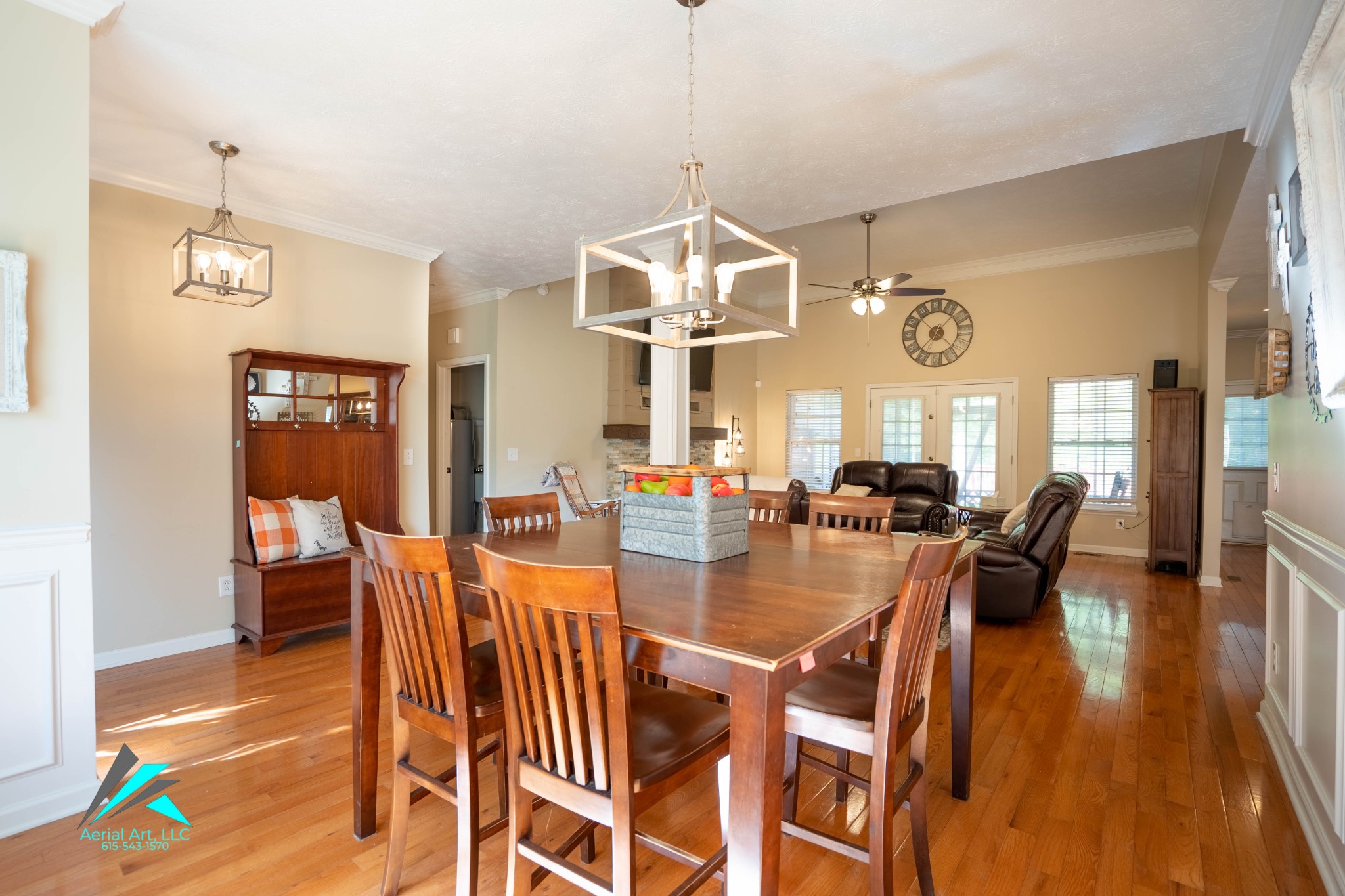 9946 Lebanon Road Murfreesboro, TN 37129 - Photo 3 of 20 a dining room with wooden floor and a chandelier