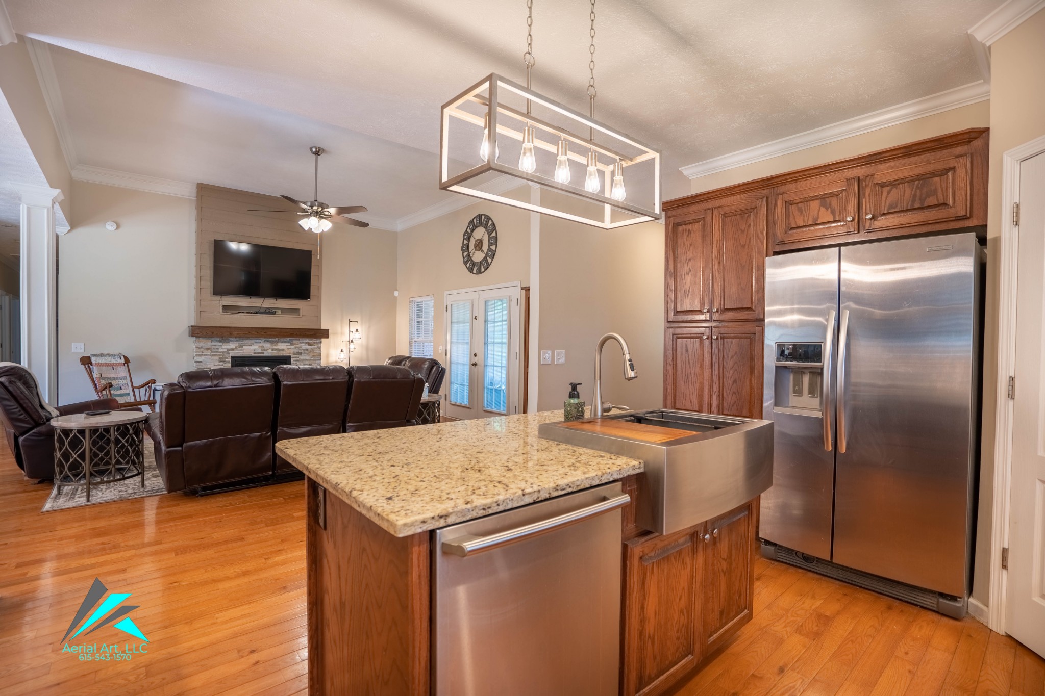 9946 Lebanon Road Murfreesboro, TN 37129 - Photo 7 of 20 a kitchen with stainless steel appliances granite countertop a refrigerator a stove and a sink with wooden floor