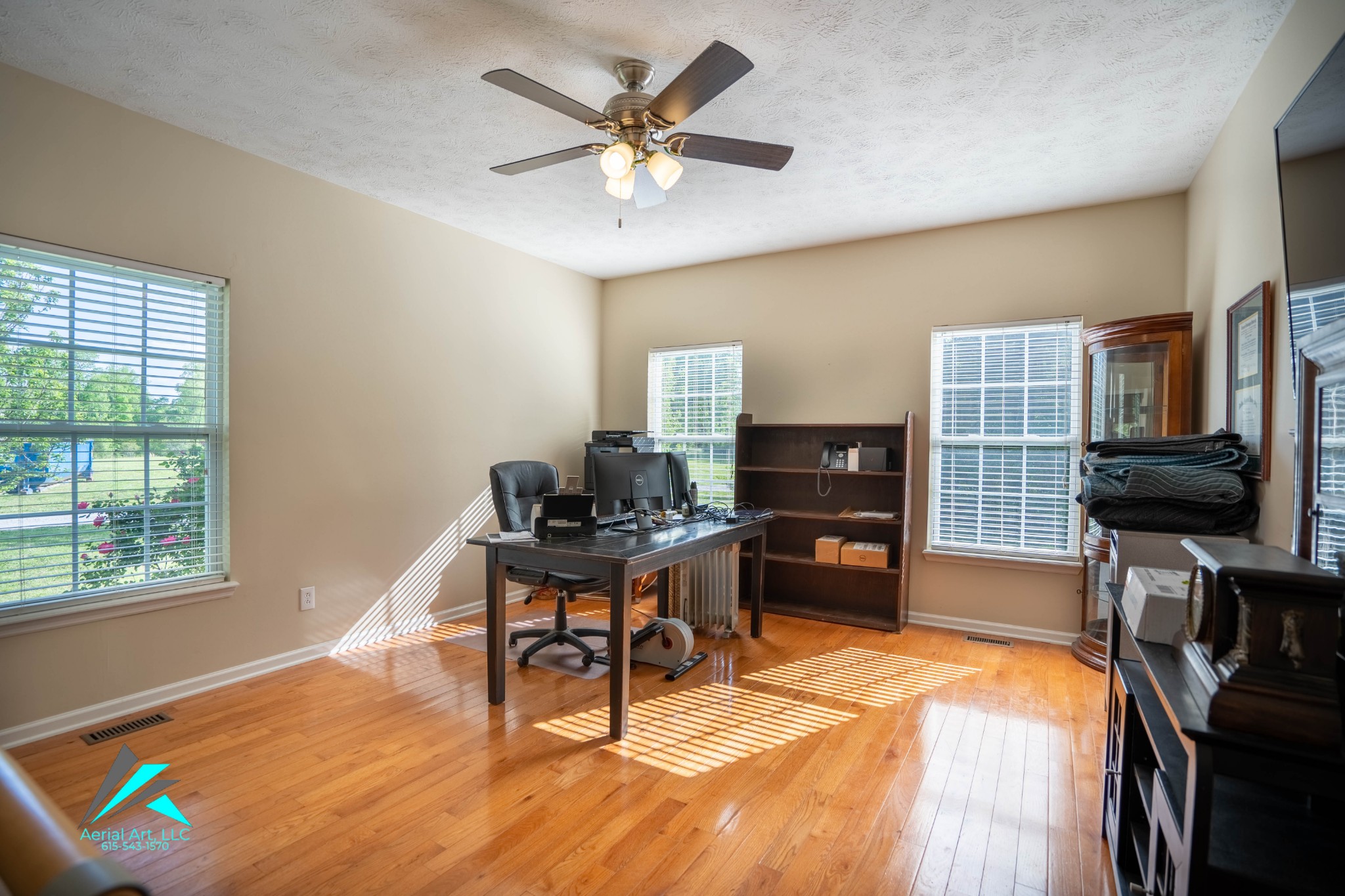 9946 Lebanon Road Murfreesboro, TN 37129 - Photo 8 of 20 a living room with furniture and a flat screen tv