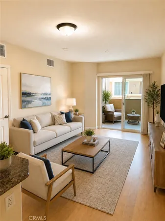a living room with furniture and a table