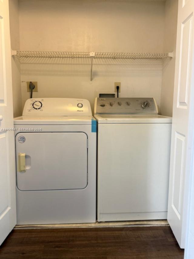 921 Lyons Road, Unit 3205 Coconut Creek, FL 33063 - Photo 16 of 37 a utility room with dryer and washer