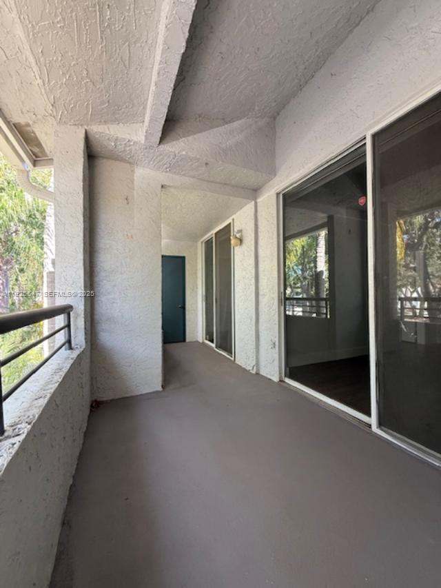 921 Lyons Road, Unit 3205 Coconut Creek, FL 33063 - Photo 24 of 37 a view of an empty room and window