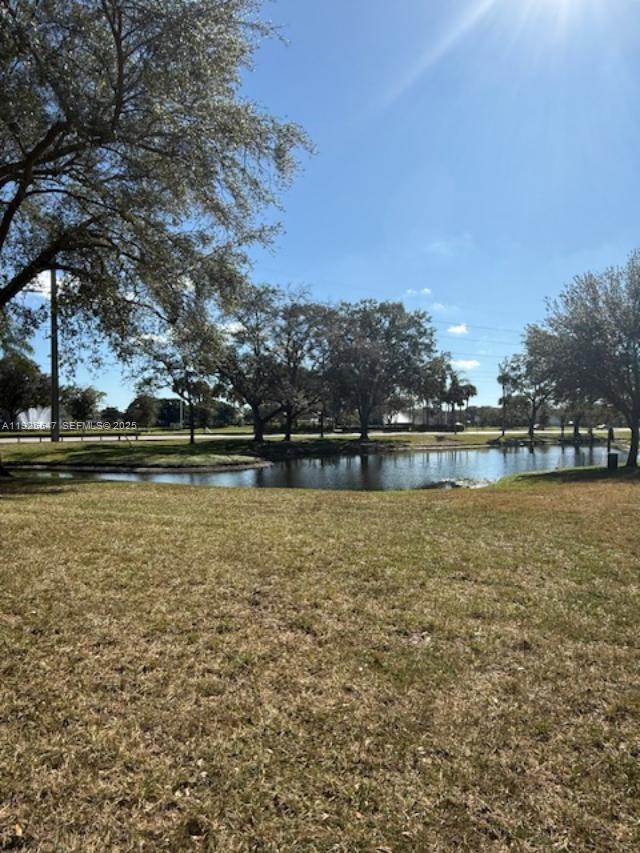 921 Lyons Road, Unit 3205 Coconut Creek, FL 33063 - Photo 36 of 37 a view of outdoor space with outdoor space