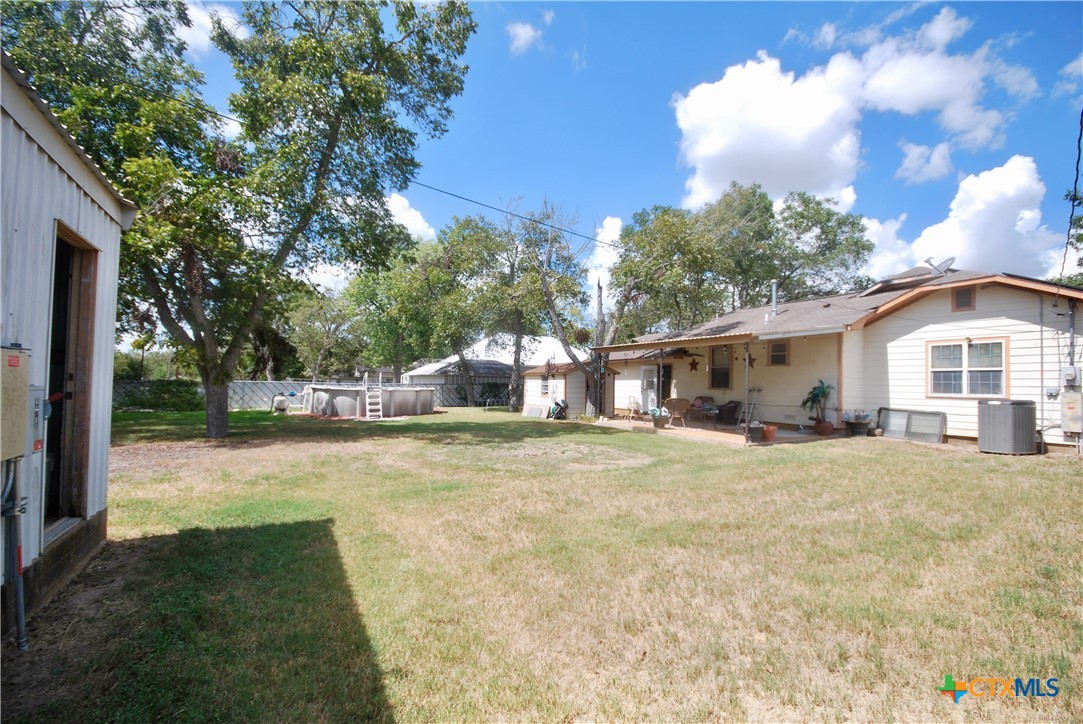302 South Main Street Schulenburg, TX 78956 - Photo 27 of 39 a front view of a house with a yard and trees