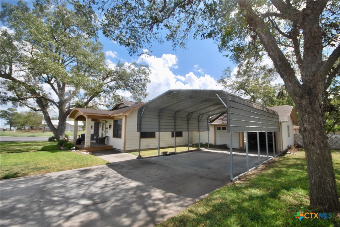 302 South Main Street Schulenburg, TX 78956 - Photo 33 of 39 a front view of house with yard and green space