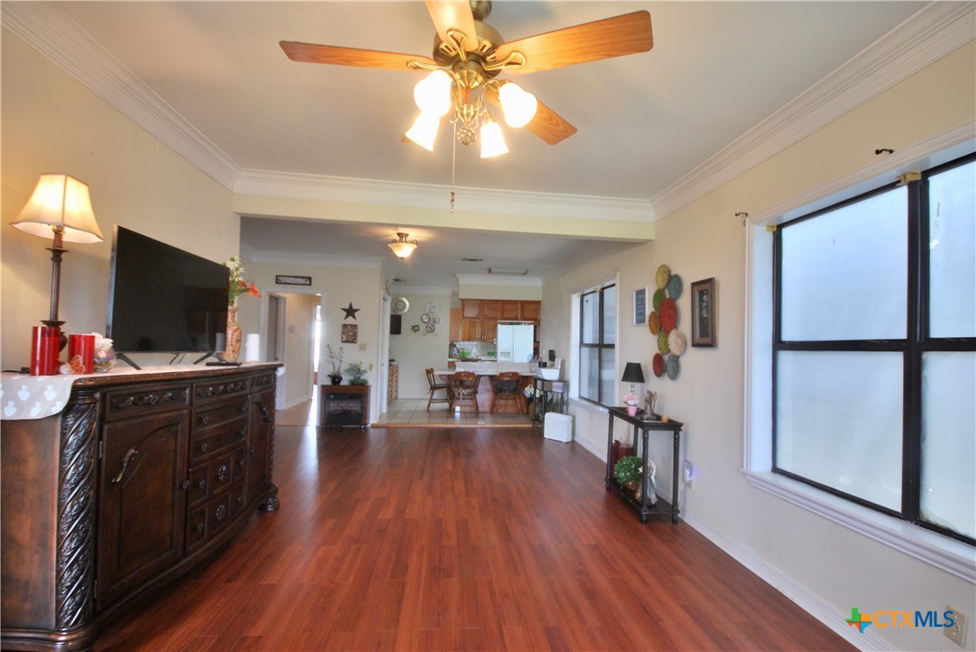 302 South Main Street Schulenburg, TX 78956 - Photo 5 of 39 a living room with furniture and a flat screen tv