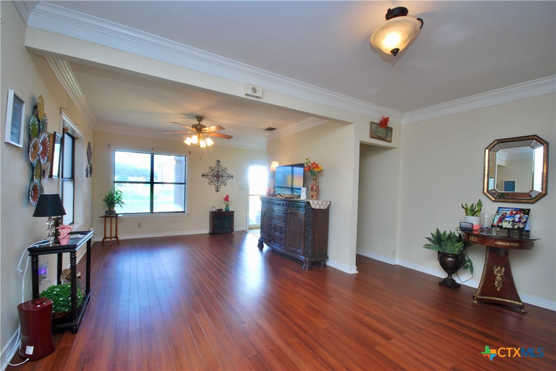 302 South Main Street Schulenburg, TX 78956 - Photo 6 of 39 a living room with furniture and a wooden floor