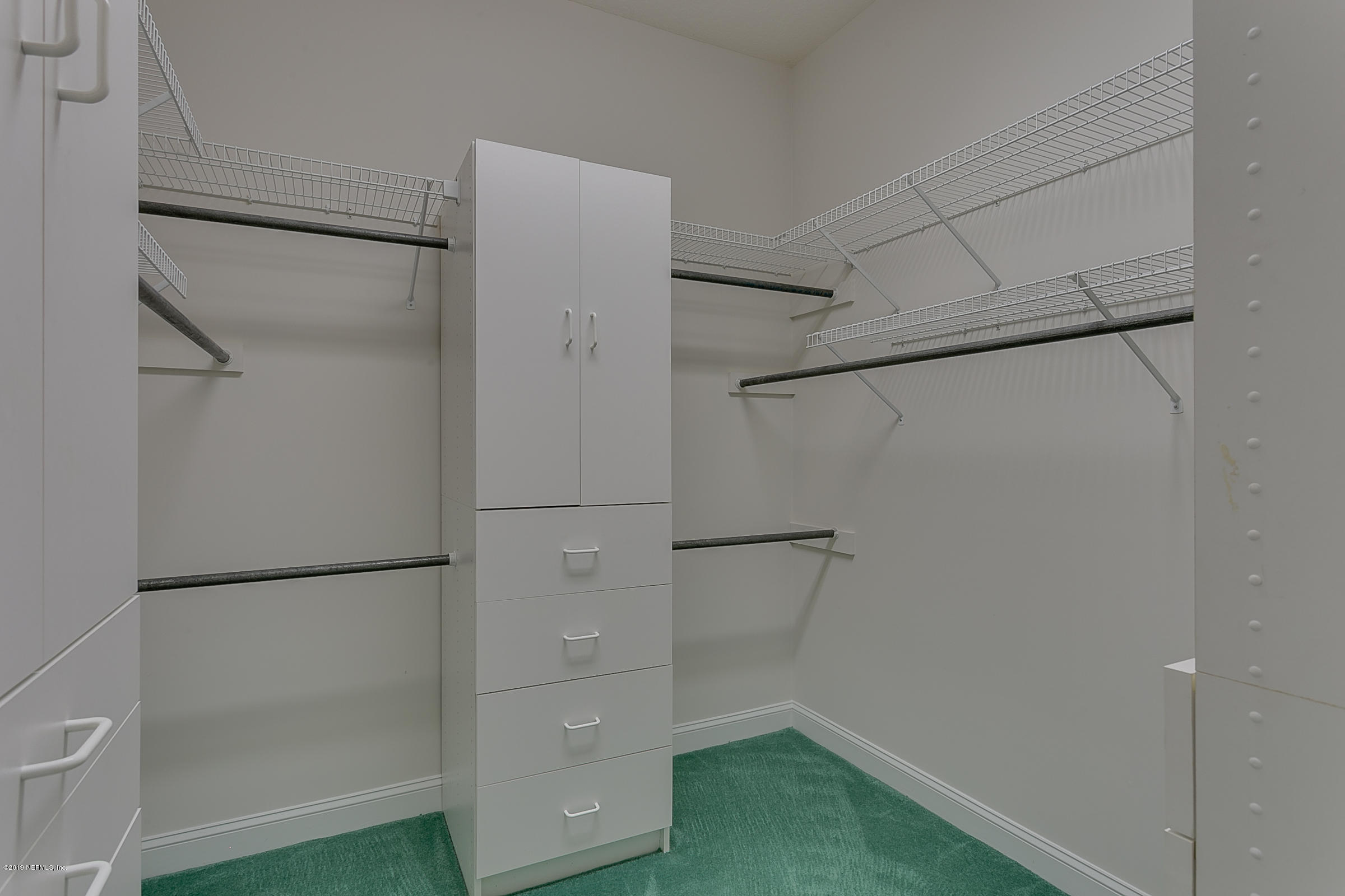4641 Raggedy Point Road Fleming Island, FL 32003 - Photo 17 of 49 Master Bedroom Walk-in closet