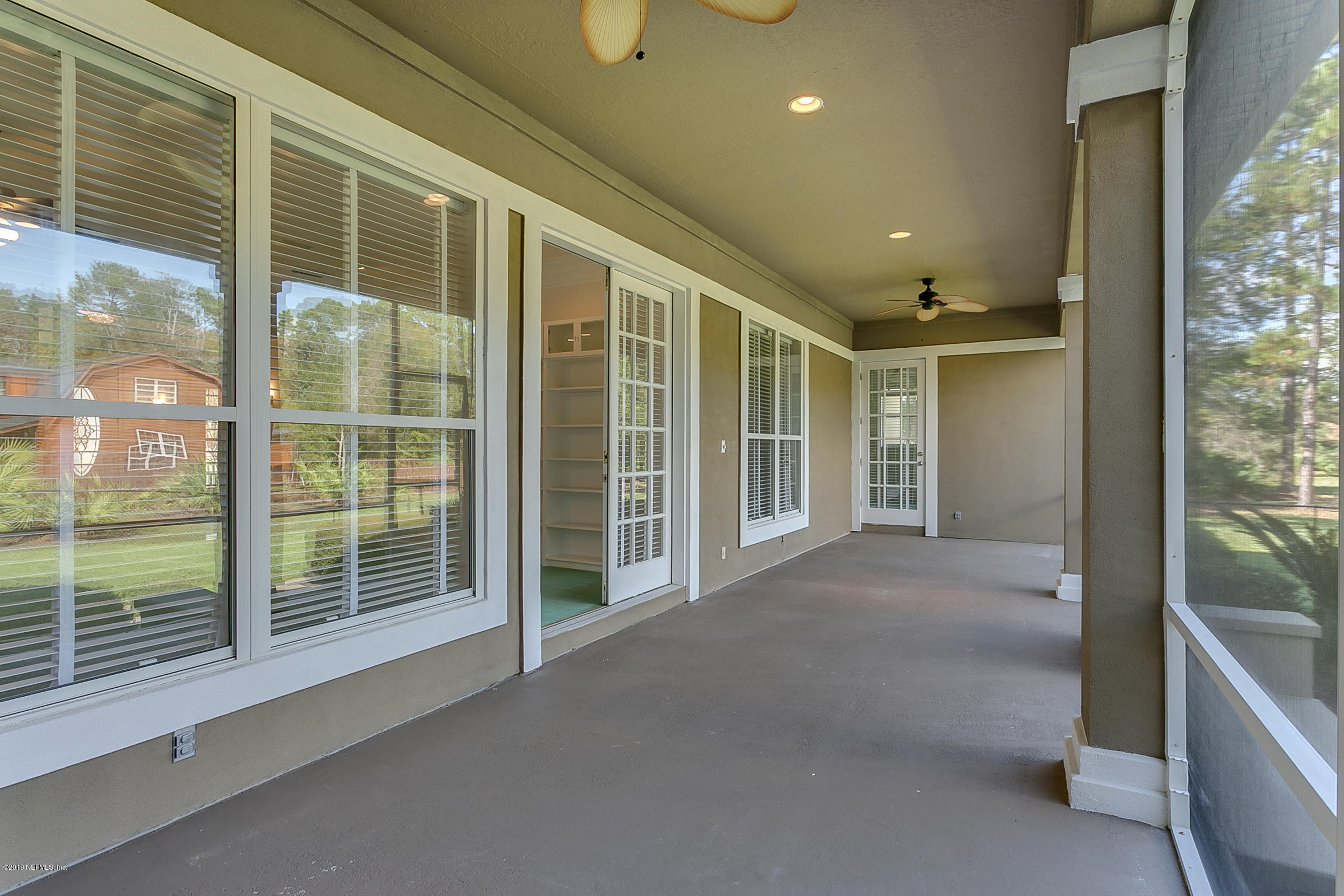4641 Raggedy Point Road Fleming Island, FL 32003 - Photo 39 of 49 Screened-in Patio