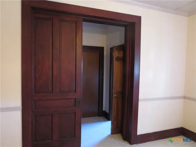 a view of elevator with hallway