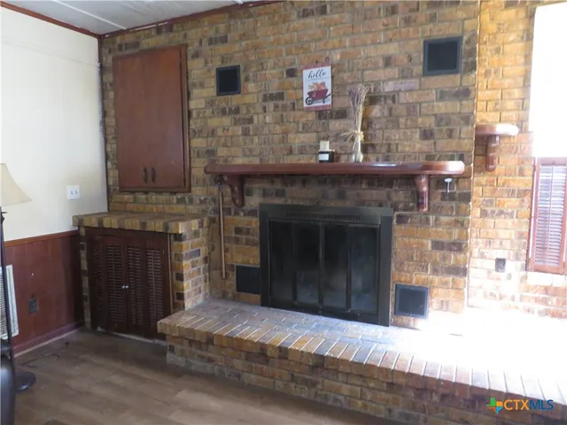 a living room with fireplace