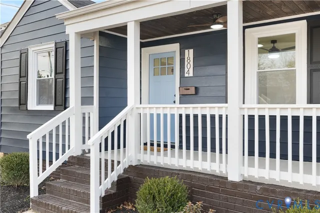 a porch with a bench
