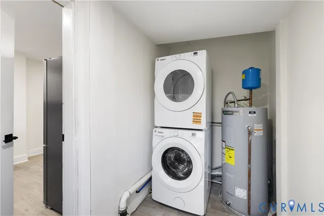 a view of a backyard with wooden fence