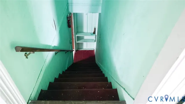 a kitchen with refrigerator and window