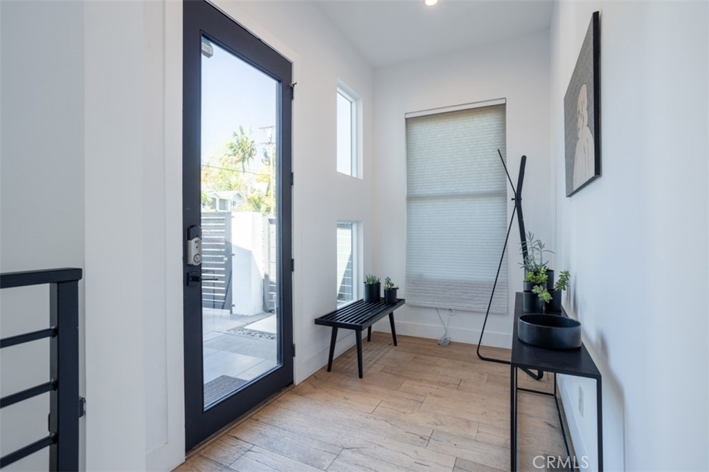 950 El Paso Drive Los Angeles, CA 90042 - Photo 11 of 52 a living room with furniture and a potted plant