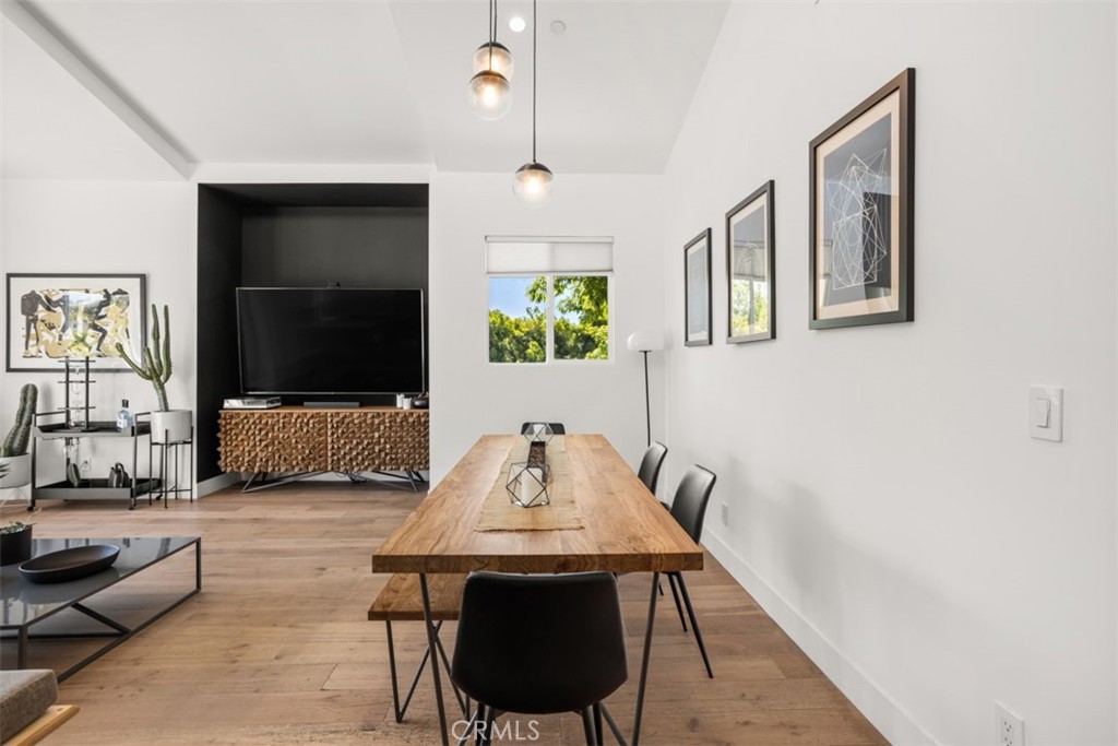 950 El Paso Drive Los Angeles, CA 90042 - Photo 13 of 52 a living room with furniture and a flat screen tv