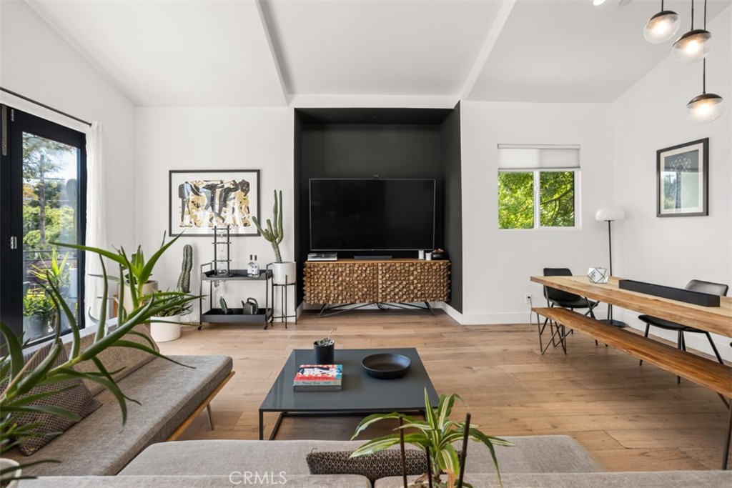 950 El Paso Drive Los Angeles, CA 90042 - Photo 15 of 52 a living room with furniture and a flat screen tv