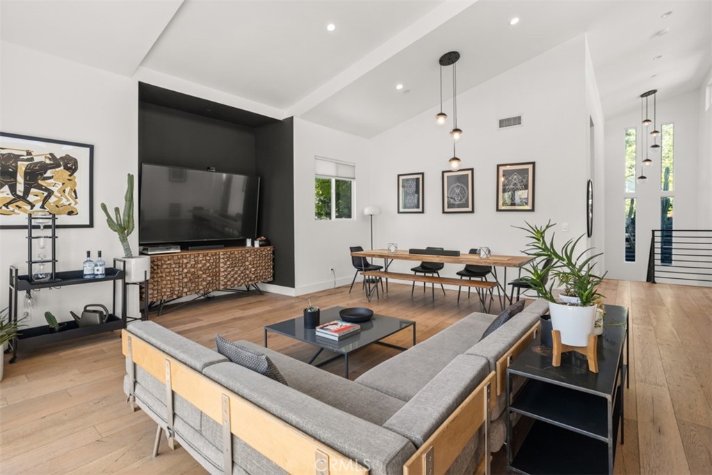 950 El Paso Drive Los Angeles, CA 90042 - Photo 17 of 52 a living room with furniture and a flat screen tv