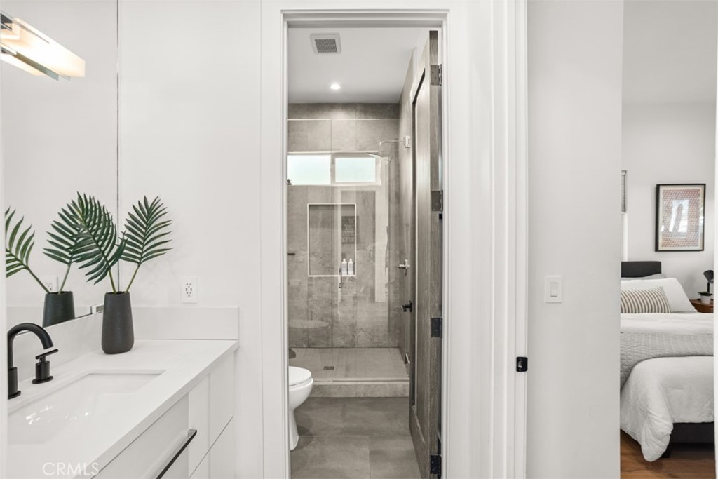 950 El Paso Drive Los Angeles, CA 90042 - Photo 22 of 52 a bathroom with a sink a toilet and shower