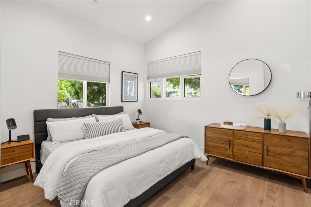950 El Paso Drive Los Angeles, CA 90042 - Photo 25 of 52 a bedroom with a bed and windows
