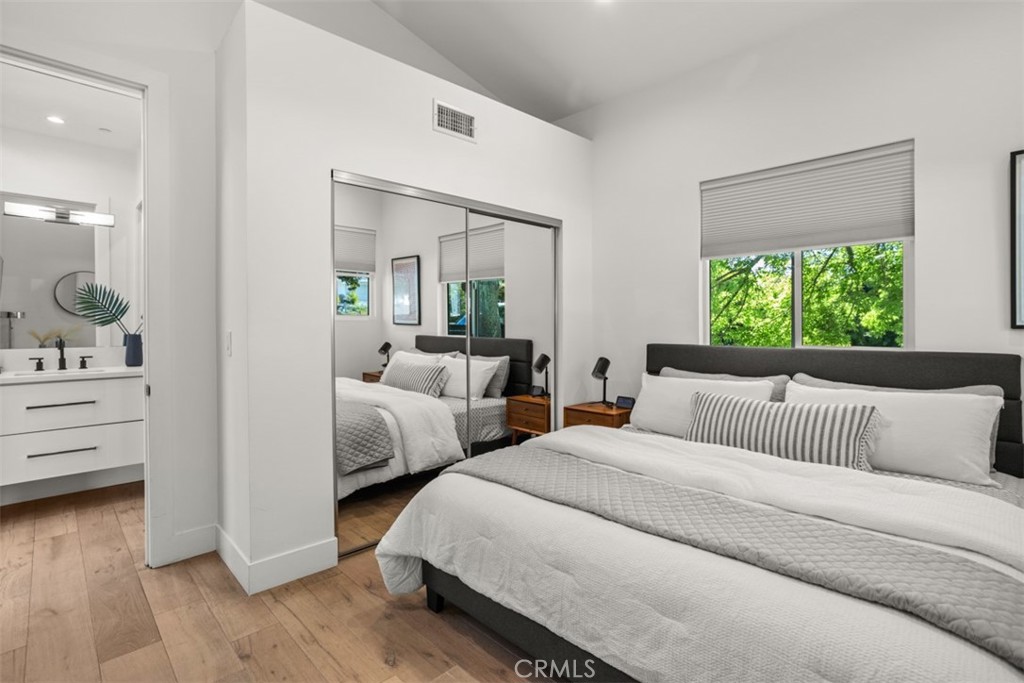 950 El Paso Drive Los Angeles, CA 90042 - Photo 26 of 52 a bedroom with furniture and a large window
