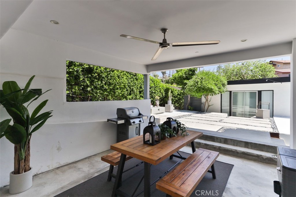 950 El Paso Drive Los Angeles, CA 90042 - Photo 36 of 52 a living room with furniture and a potted plant